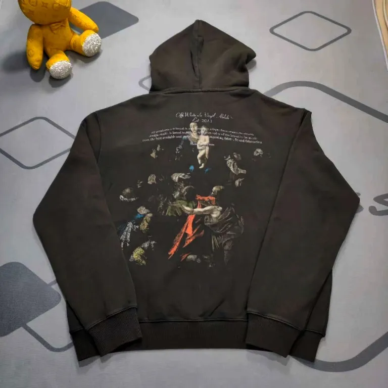 The top proven version OFF back religious WHITE hooded sweatshirt OW jacket hoodie oversize same style for male and female couples stars. As a street fashion art in the luxury ranks, off white has always attracted many fans with its classic logo and trendy creativity. Not only is it an understanding of fashion, off white also intuitively reflects ♻️ environmental awareness in many works, and treats the world gently.  The kangaroo pocket adopts a special machine crimping process with externally shaped wiring. The brim of the hat is designed with threads, which is the first thing to look at when appraising.   The fabric is made of 480g terry cotton fabric with full drape.  Color: Black Size: XS-L P:430